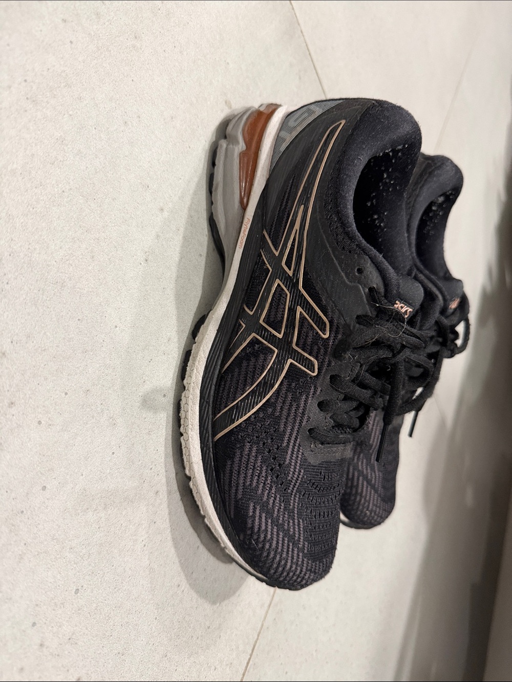 Asics Black Sneakers with Copper Accents